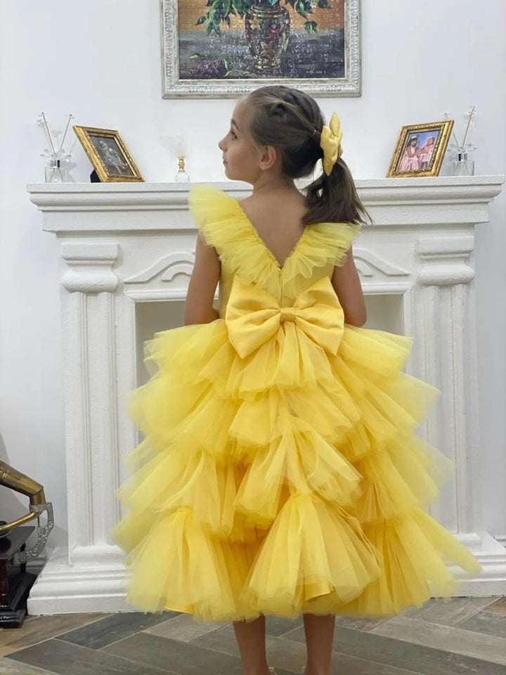 Sunnypetal Yellow Layered Tulle Flower Girl Dress with V-Neck Ruffles and Bow Back